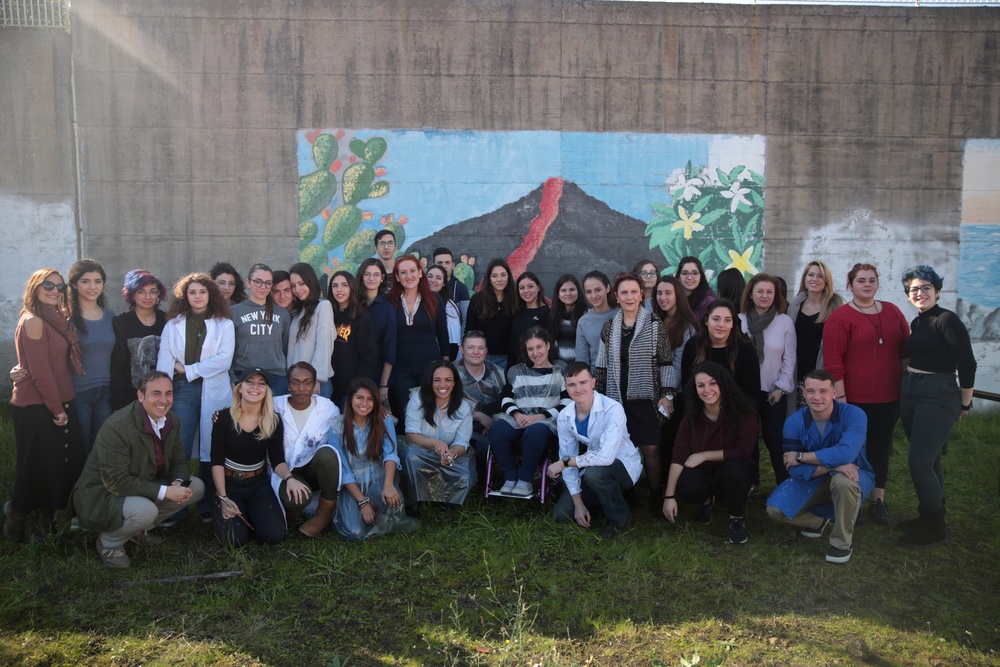 SPMAGTF Marines and Sailors Paint School Mural