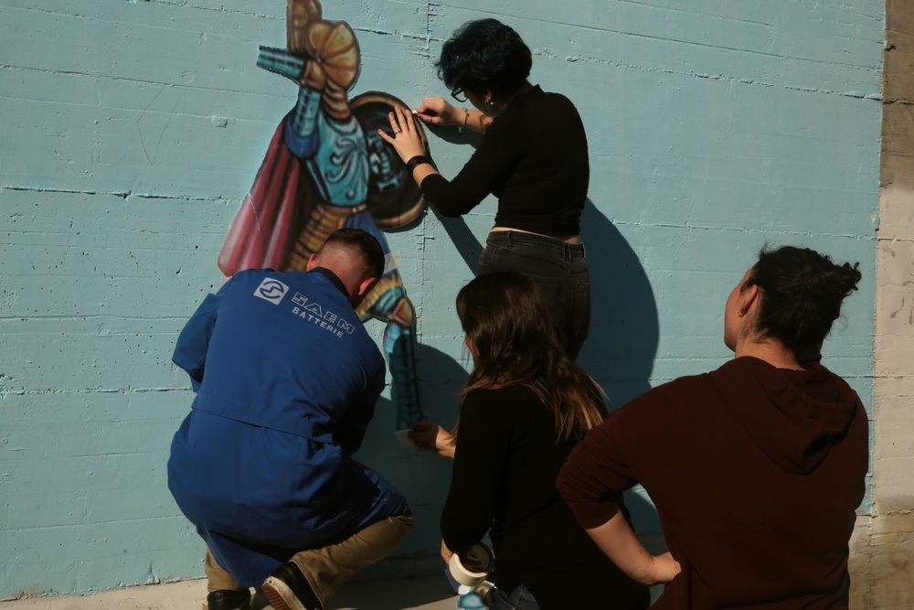 SPMAGTF Marines and Sailors Paint School Mural