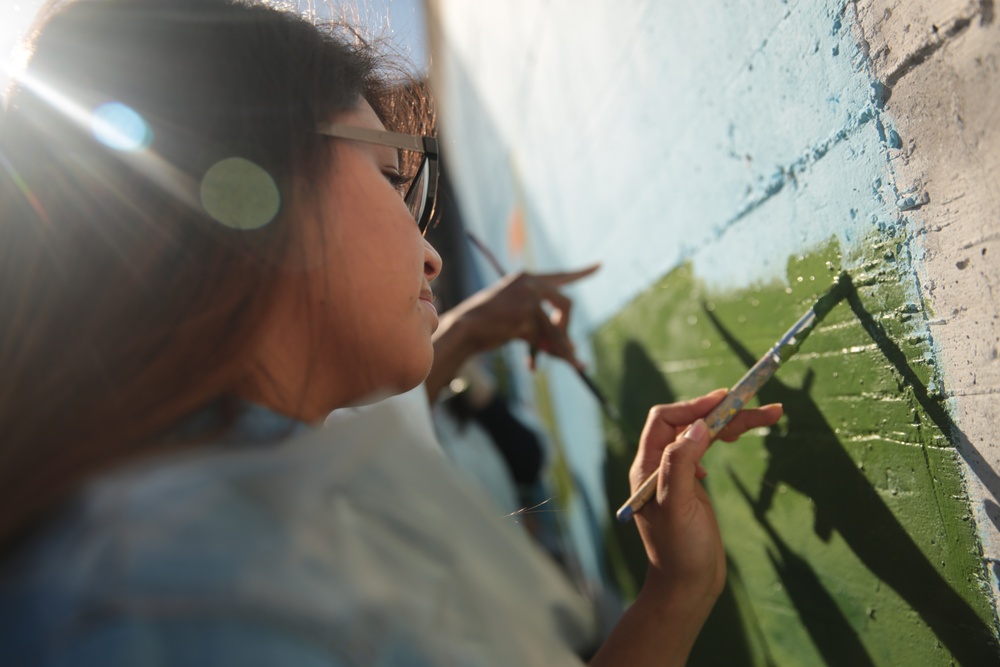 SPMAGTF Marines and Sailors Paint School Mural