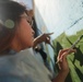 SPMAGTF Marines and Sailors Paint School Mural