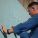 SPMAGTF Marines and Sailors Paint School Mural