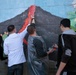 SPMAGTF Marines and Sailors Paint School Mural