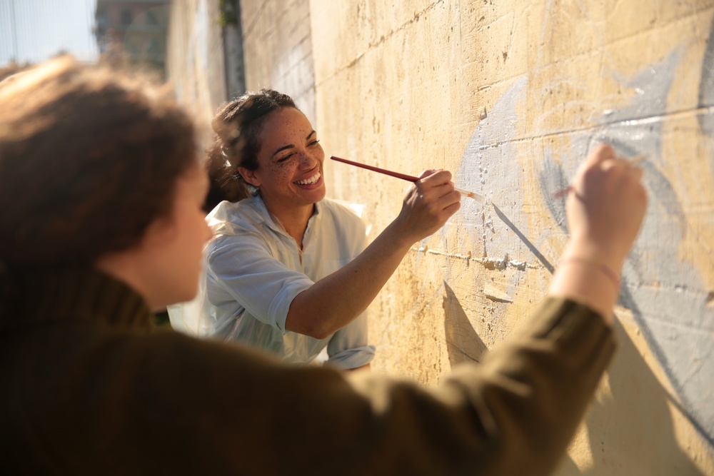 SPMAGTF Marines and Sailors Paint School Mural