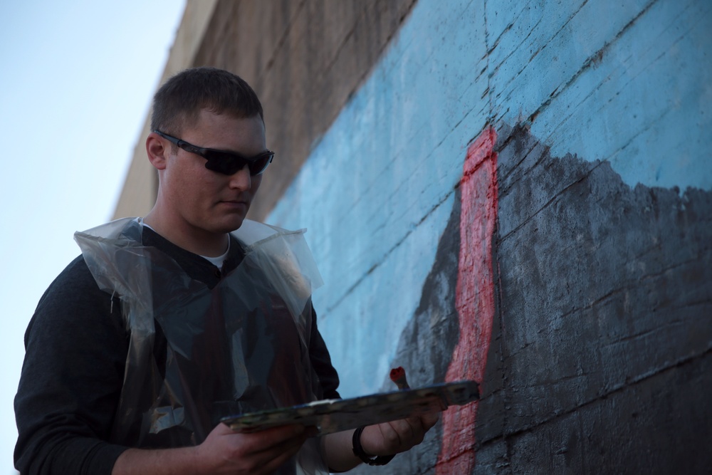 SPMAGTF Marines and Sailors Paint School Mural