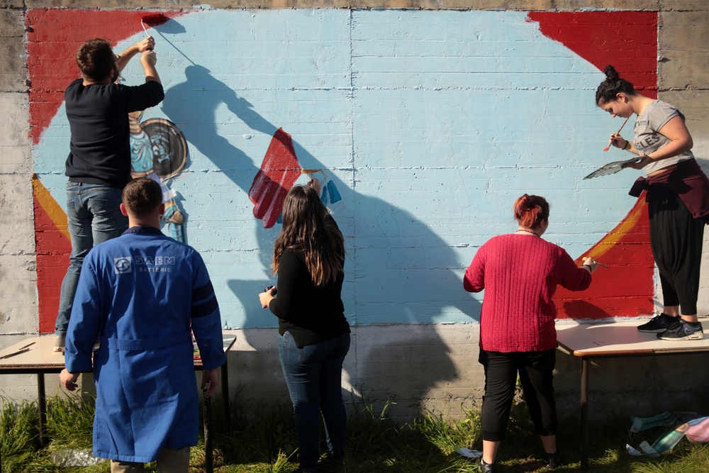 SPMAGTF Marines and Sailors Paint School Mural