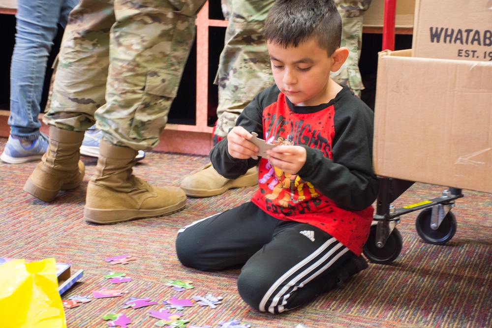 U.S. Army Recruiters Partner with Boys and Girls Club for Gift Giving