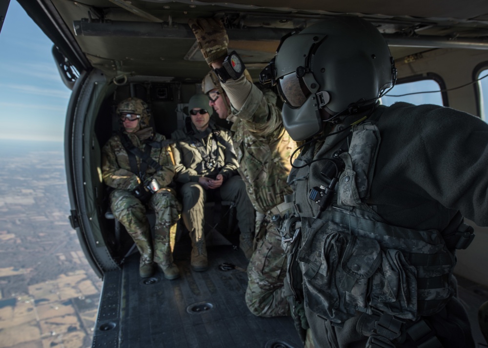 DVIDS - Images - Tactical Air Control Airman Looks Out of UH-60 Black ...