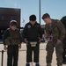 Airman Guides Brothers on How to Use EOD Robot