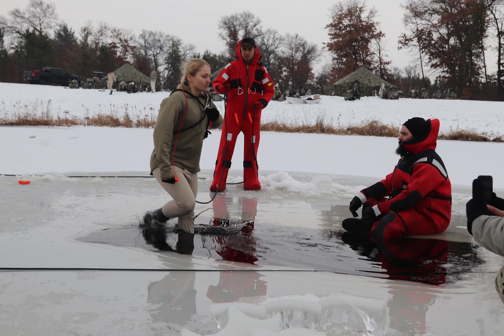 Students participate in cold-water immersion training for CWOC Class 19-01 at Fort McCoy