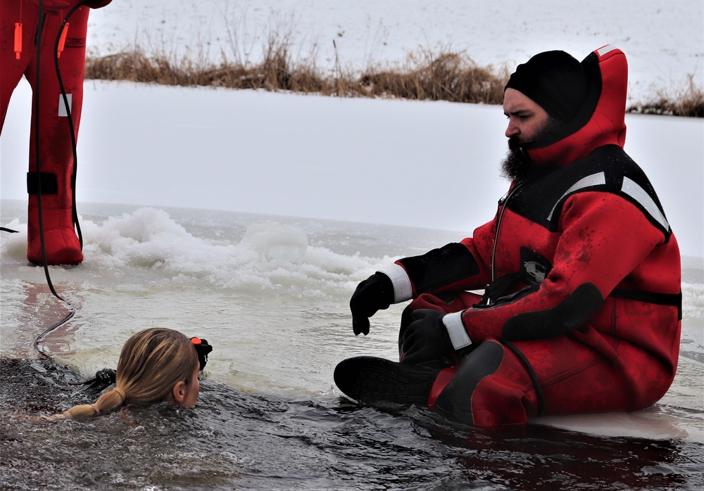 Students participate in cold-water immersion training for CWOC Class 19-01 at Fort McCoy