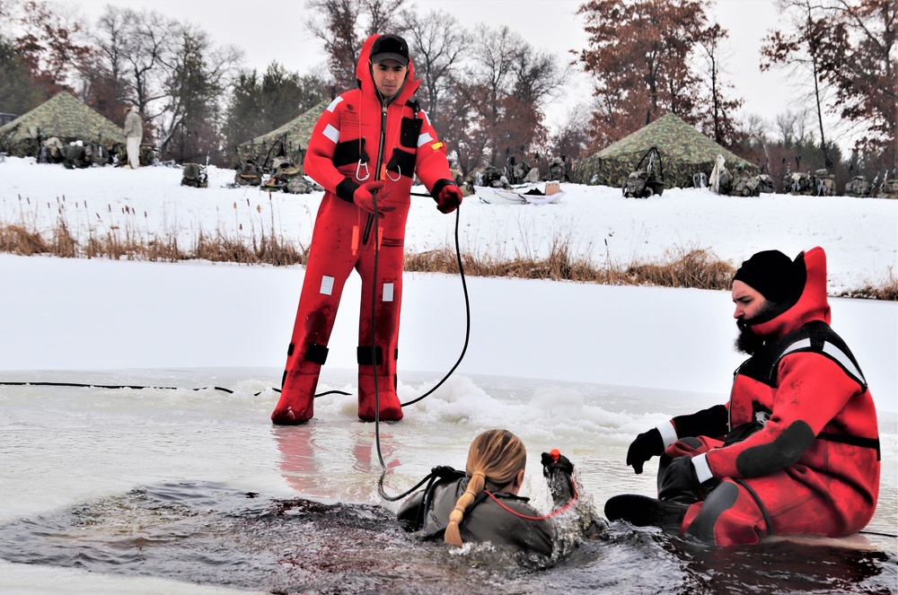 Students participate in cold-water immersion training for CWOC Class 19-01 at Fort McCoy