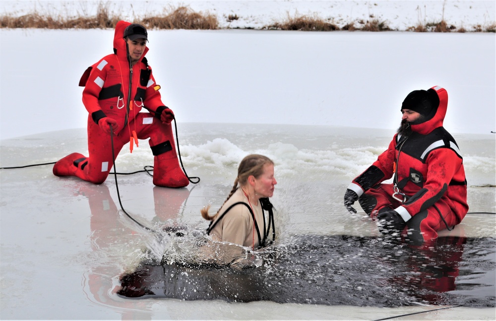 Students participate in cold-water immersion training for CWOC Class 19-01 at Fort McCoy