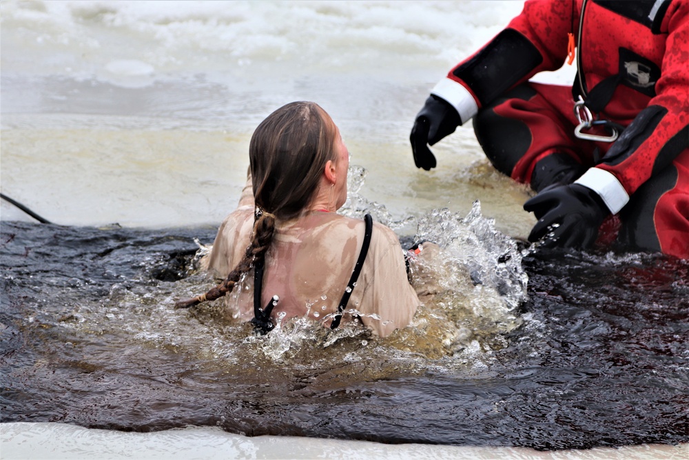 Students participate in cold-water immersion training for CWOC Class 19-01 at Fort McCoy