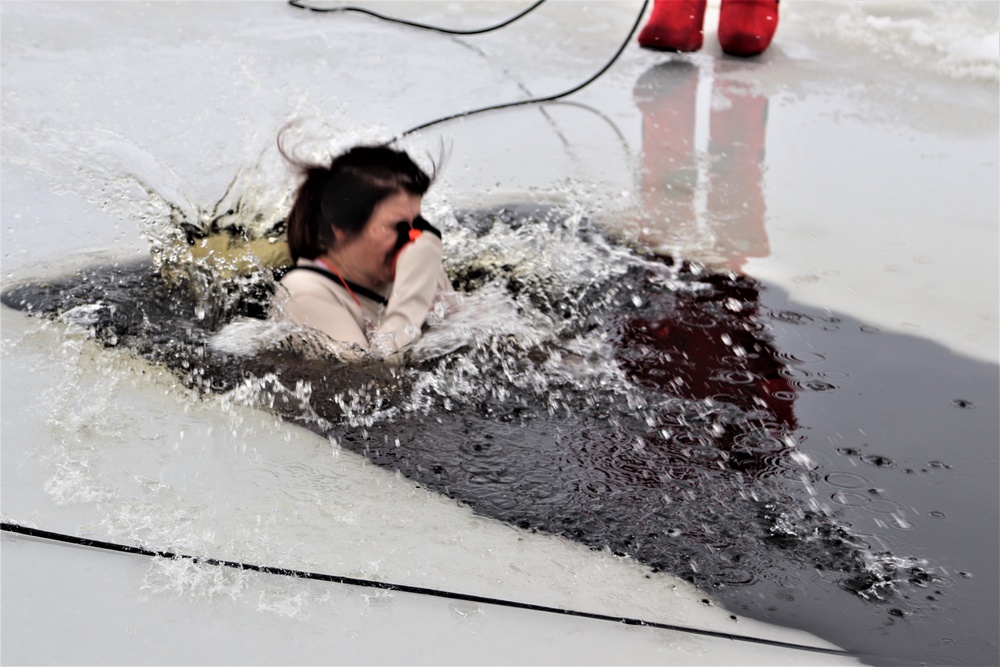 Students participate in cold-water immersion training for CWOC Class 19-01 at Fort McCoy