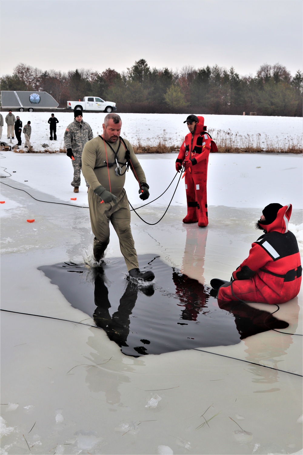 Students participate in cold-water immersion training for CWOC Class 19-01 at Fort McCoy