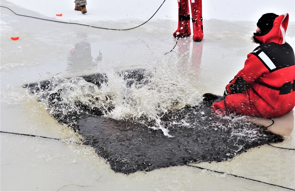 Students participate in cold-water immersion training for CWOC Class 19-01 at Fort McCoy