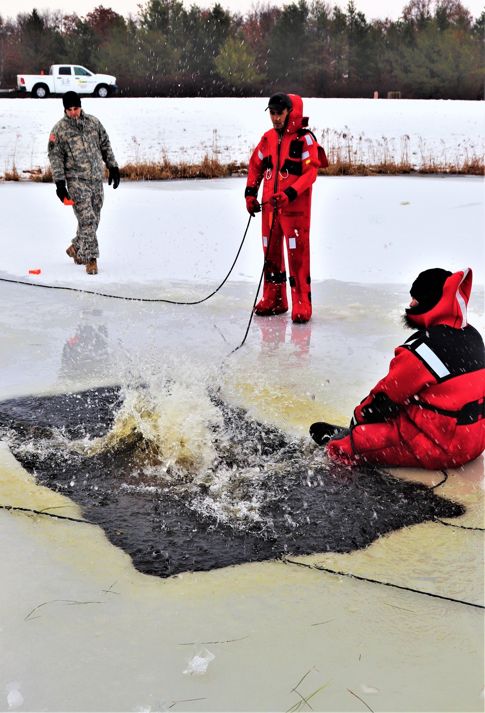 Students participate in cold-water immersion training for CWOC Class 19-01 at Fort McCoy