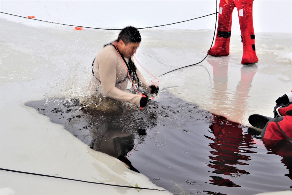 Students participate in cold-water immersion training for CWOC Class 19-01 at Fort McCoy