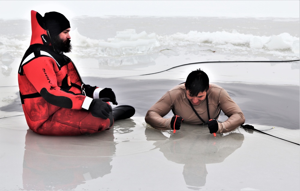 Students participate in cold-water immersion training for CWOC Class 19-01 at Fort McCoy