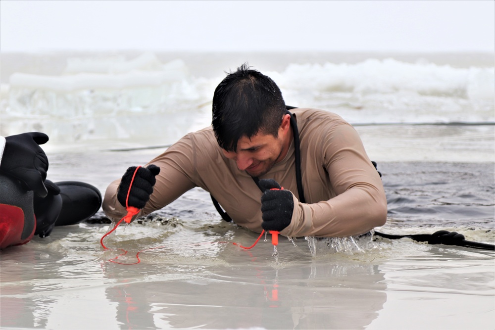 Students participate in cold-water immersion training for CWOC Class 19-01 at Fort McCoy