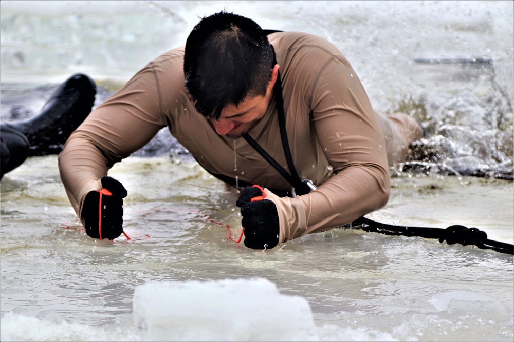 Students participate in cold-water immersion training for CWOC Class 19-01 at Fort McCoy