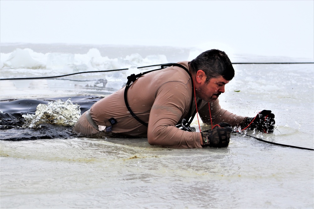 Students participate in cold-water immersion training for CWOC Class 19-01 at Fort McCoy