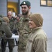 Tech. Sgt. Jessica Rayl smiles as a Danish soldier looks on