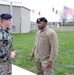 Senior Master Sgt. Aaron Doss, Combat Arms Functional Manager for AFRC, right, speaks with SGT Marn Eric Commandeur