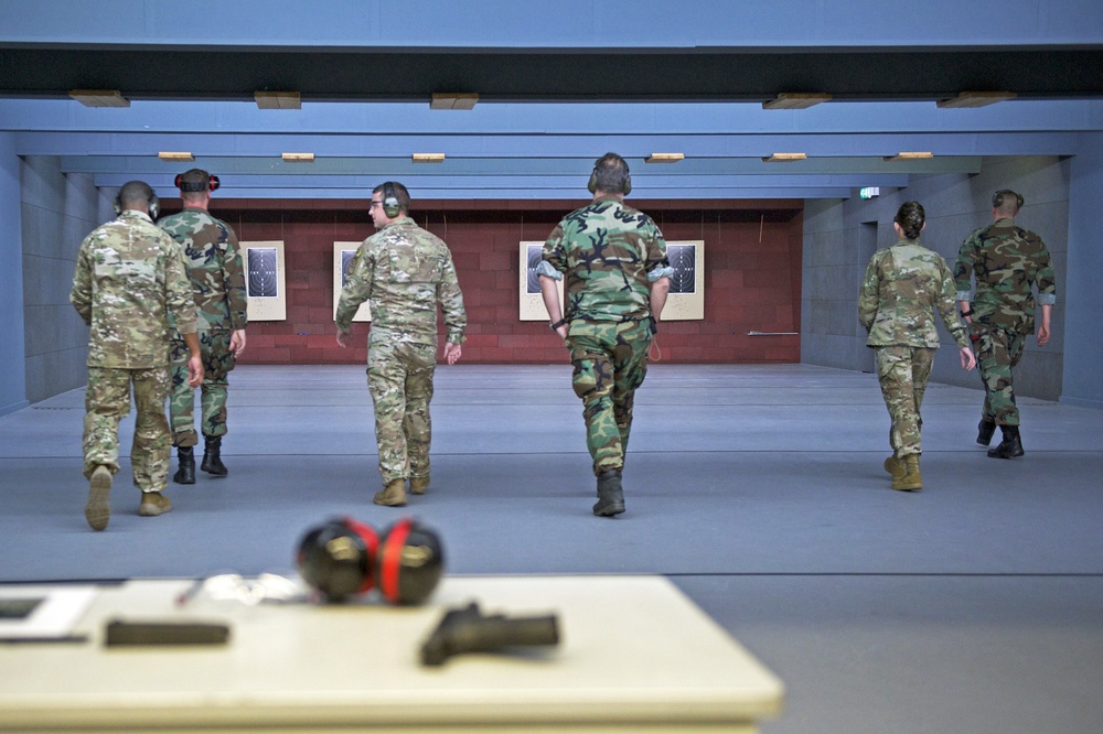 The Air Force Reserve Command Shooting Team walks down range to collect their scores