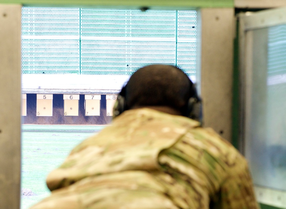 Tech. Sgt. Gregory Myers looks down range at his target