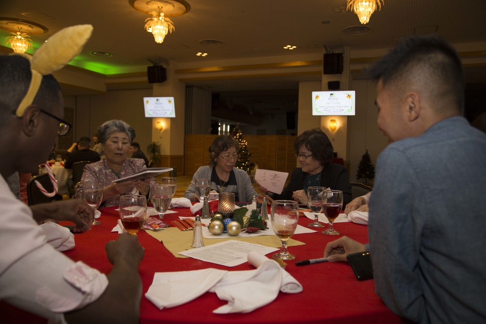 Marines participate in Kojyu University English language Christmas party
