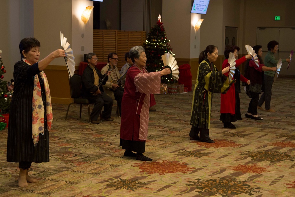 Marines participate in Kojyu University English language Christmas party