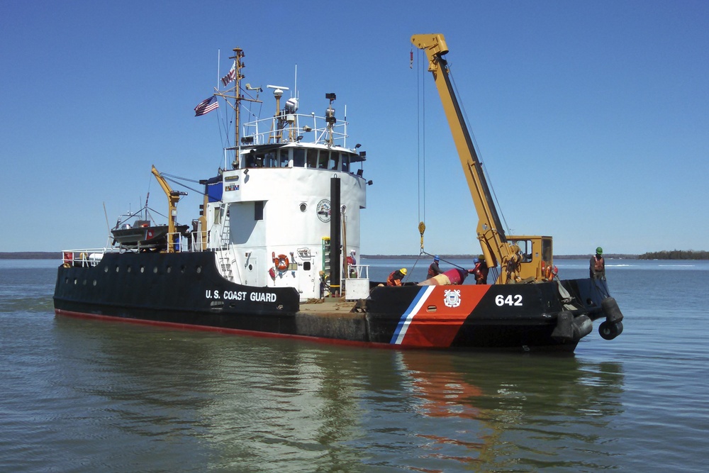 Coast Guard Cutter Buckthorn services ATON in St. Marys River