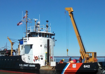 Coast Guard Cutter Buckthorn services ATON in St. Marys River