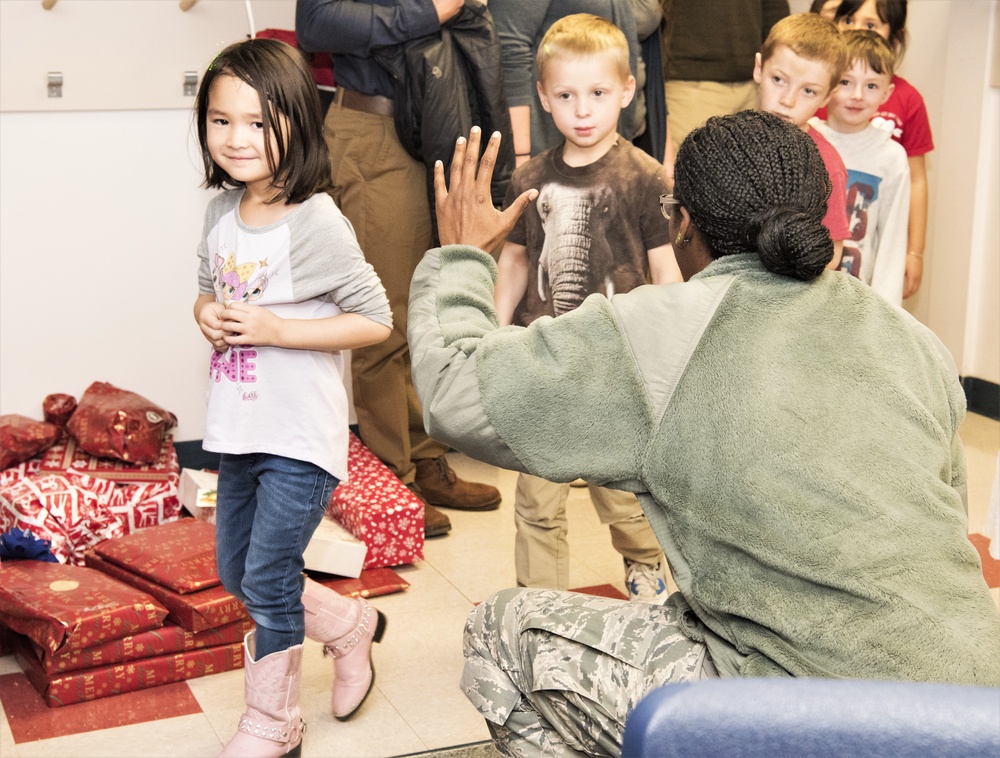 Schriever Chaplains deliver Angel Tree gifts to Ellicott
