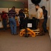 DLA staff members carefully move Naval Museum's larger artifacts