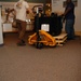 DLA staff members carefully move Naval Museum's larger artifacts