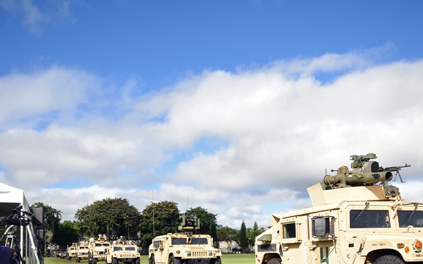 Military equiment passes in review