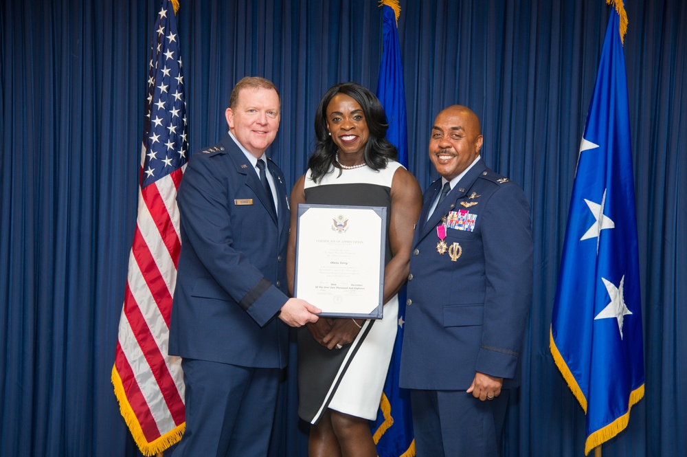 Lt. Gen. Scobee presents certificate to Mrs. Olivia Terry
