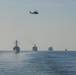 U.S. Navy ships transit the Strait of Hormuz