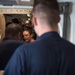 U.S. Navy Sailors transport food and supplies aboard the guided-missile cruiser USS Mobile Bay