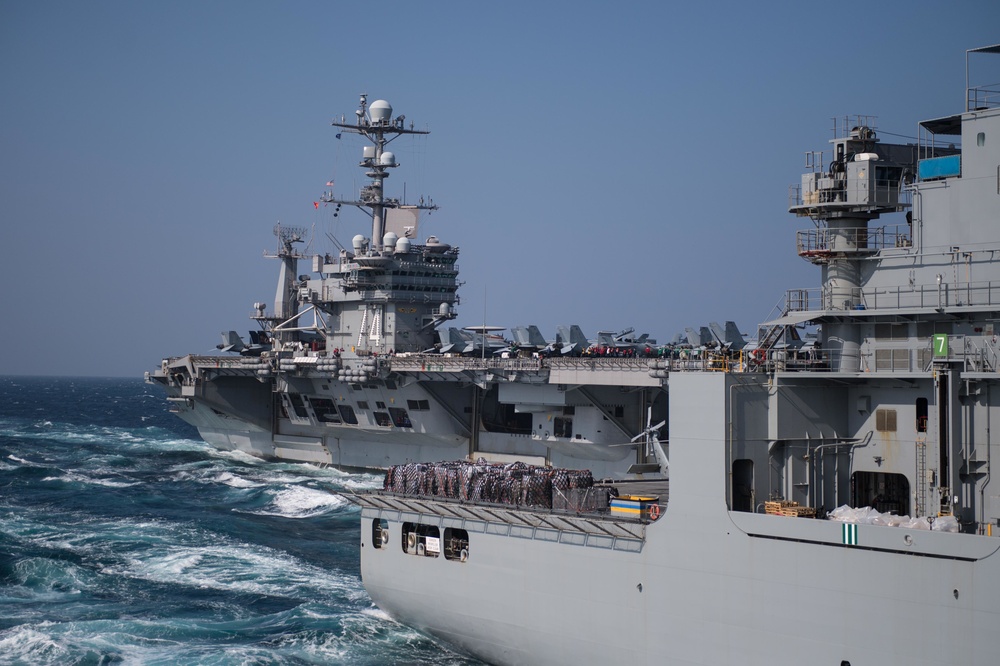 USS John C. Stennis conducts a replenishment-at-sea with USNS Charles Drew