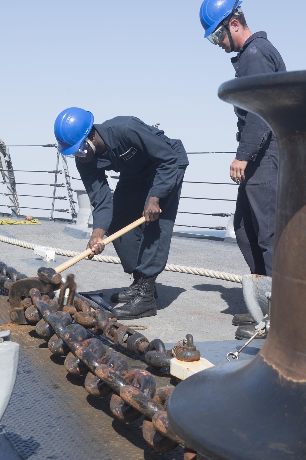 U.S. Navy Sailors drop the anchor aboard the guided-missile destroyer USS Spruance (DDG 111) off the coast of Duqm, Oman