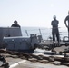 U.S. Navy Sailors drop the anchor aboard the guided-missile destroyer USS Spruance (DDG 111) off the coast of Duqm, Oman