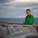 Airman Jared Gonzalez, from Houston, watches the sunset from a catwalk aboard the Nimitz-class aircraft carrier USS John C. Stennis (CVN 74). John C. Stennis is underway conducting routine operations in the U.S. 3rd Fleet area of operations.