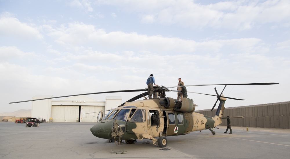 TAAC-Air Airmen and Soliders perform training mission with Afghan aircrew members