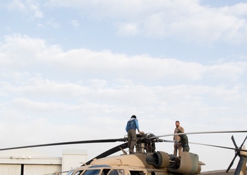 TAAC-Air Airmen and Soliders perform training mission with Afghan aircrew members