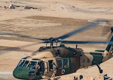 TAAC-Air Airmen and Soliders perform training mission with Afghan aircrew members