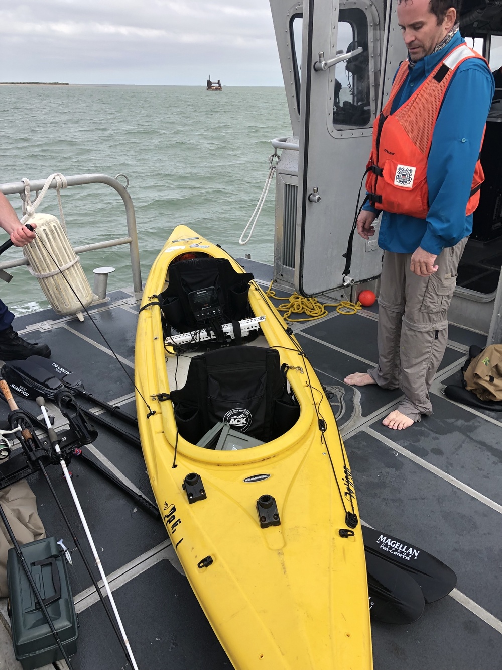 Coast Guard rescues 2 fishermen from capsized kayak