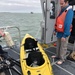 Coast Guard rescues 2 fishermen from capsized kayak